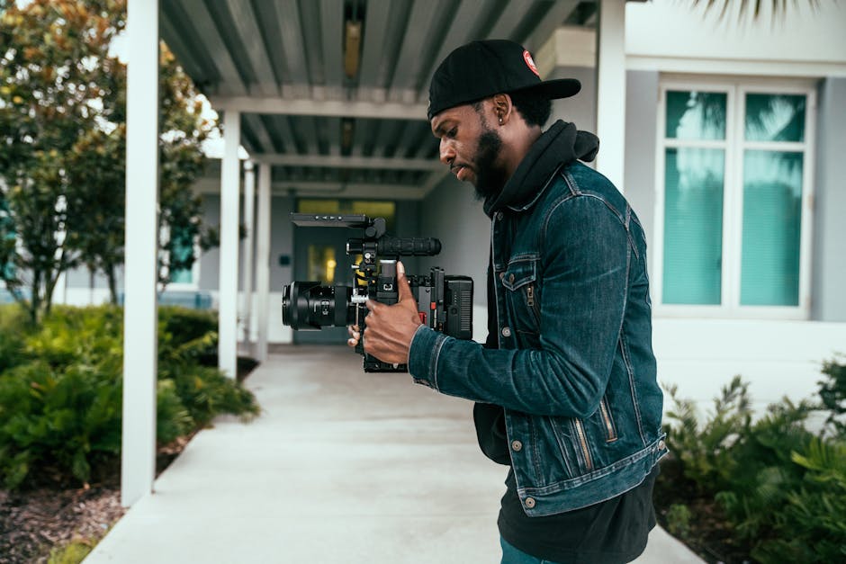 Professional wedding videographer capturing a moment
